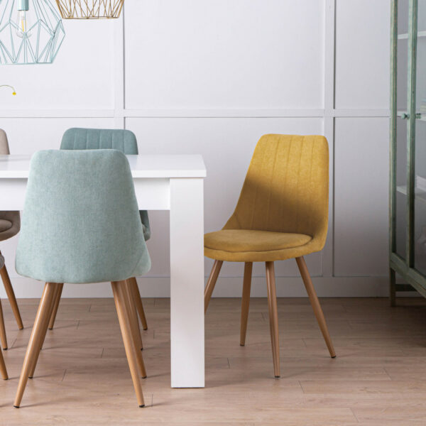 esta preciosa silla con patas de metal efecto madera destaca por su cómoda sentada y su diseño de líneas sencillas. Elige uno de los 4 colores disponibles en nuestra web y dale un toque elegante a tu salón.