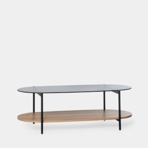Añade un toque distintivo a tu hogar con la mesa de centro en cristal ahumado con pata metálica negra Casil. El cristal ahumado aporta un aspecto vanguardista y moderno que no pasará desapercibido en tu salón. Además